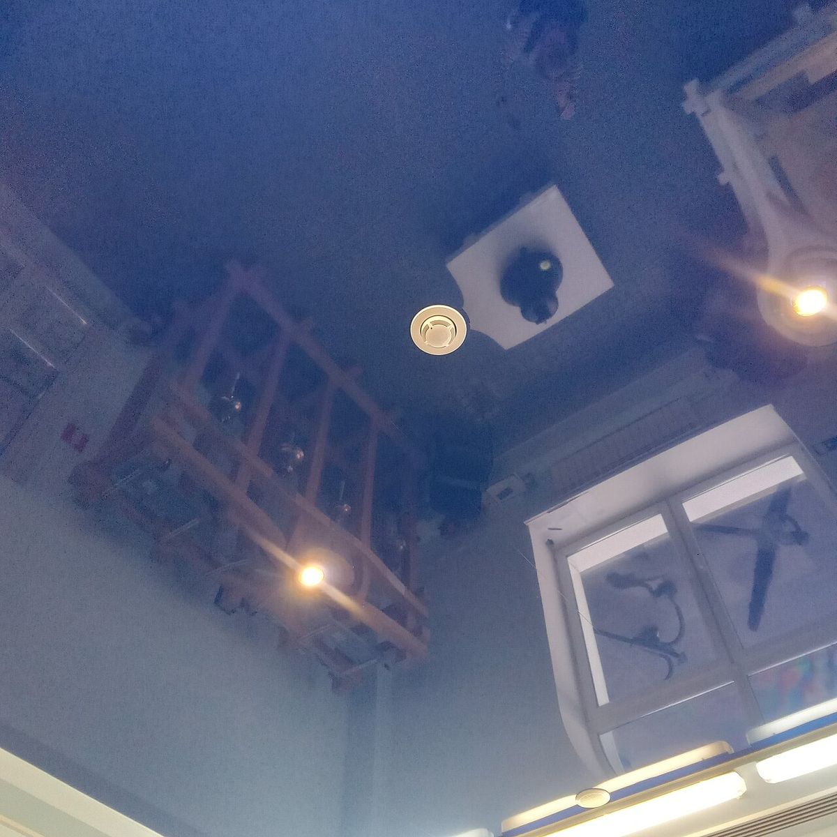 Smoke detector installed on a home ceiling