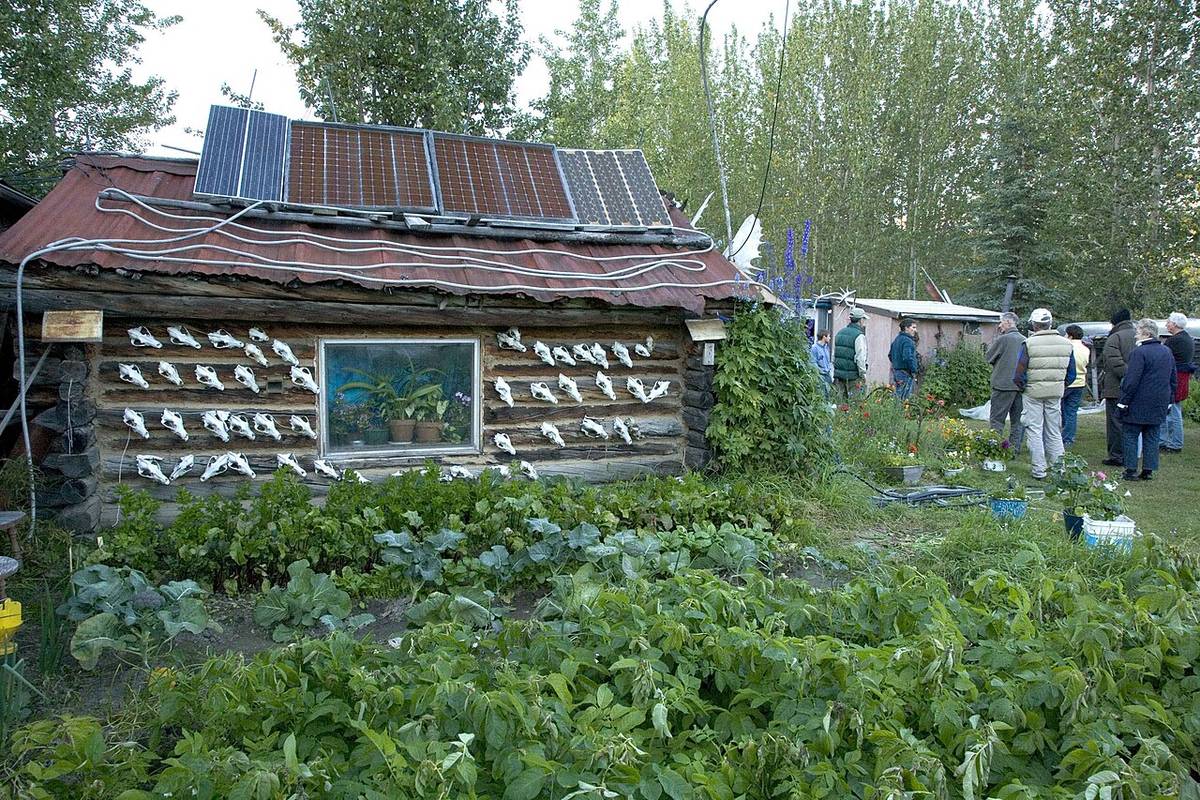 Cabin with solar panels on the roof