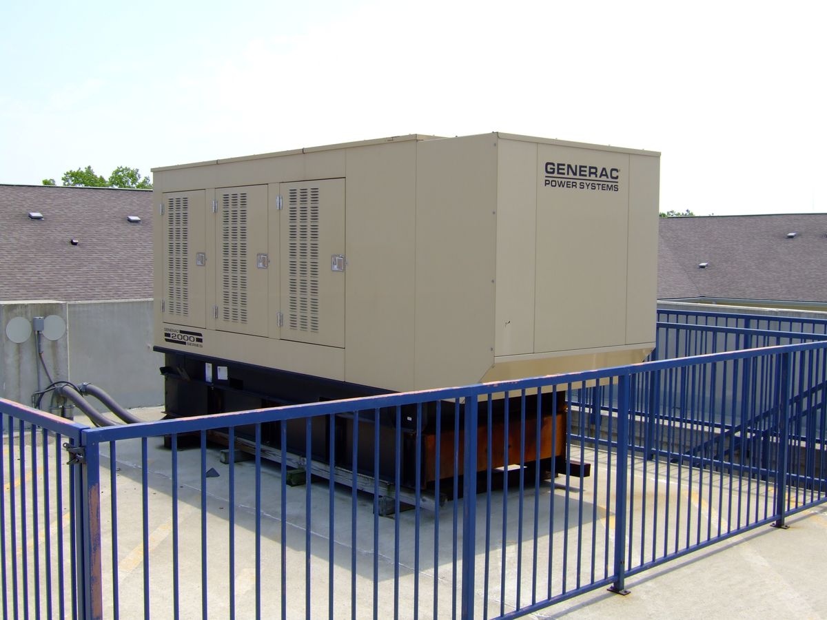 Standby generator enclosure installed on a rooftop deck