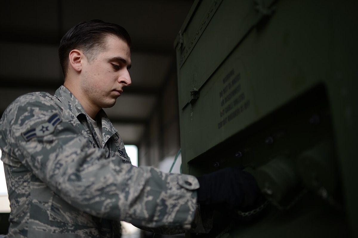 Technician servicing a standby home generator
