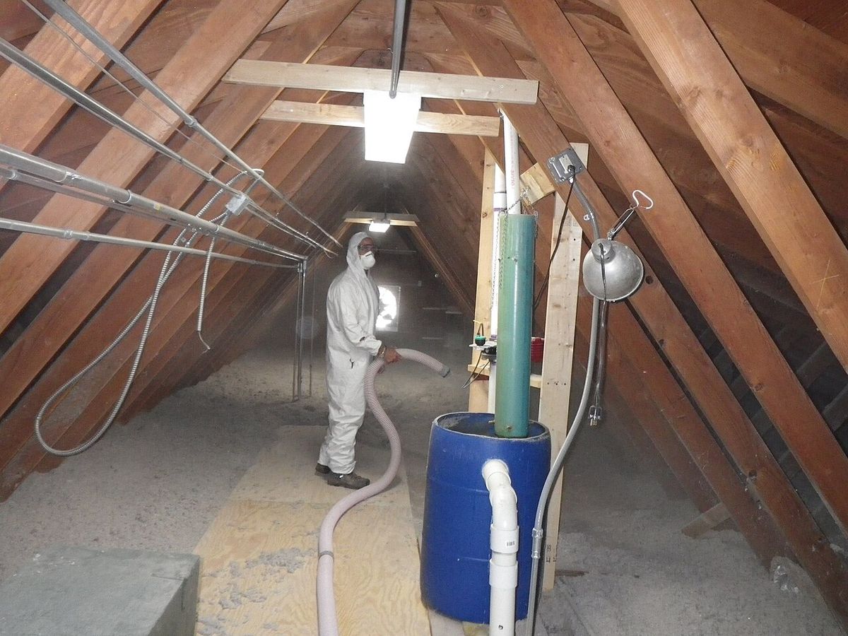 Insulated attic with wrapped ductwork