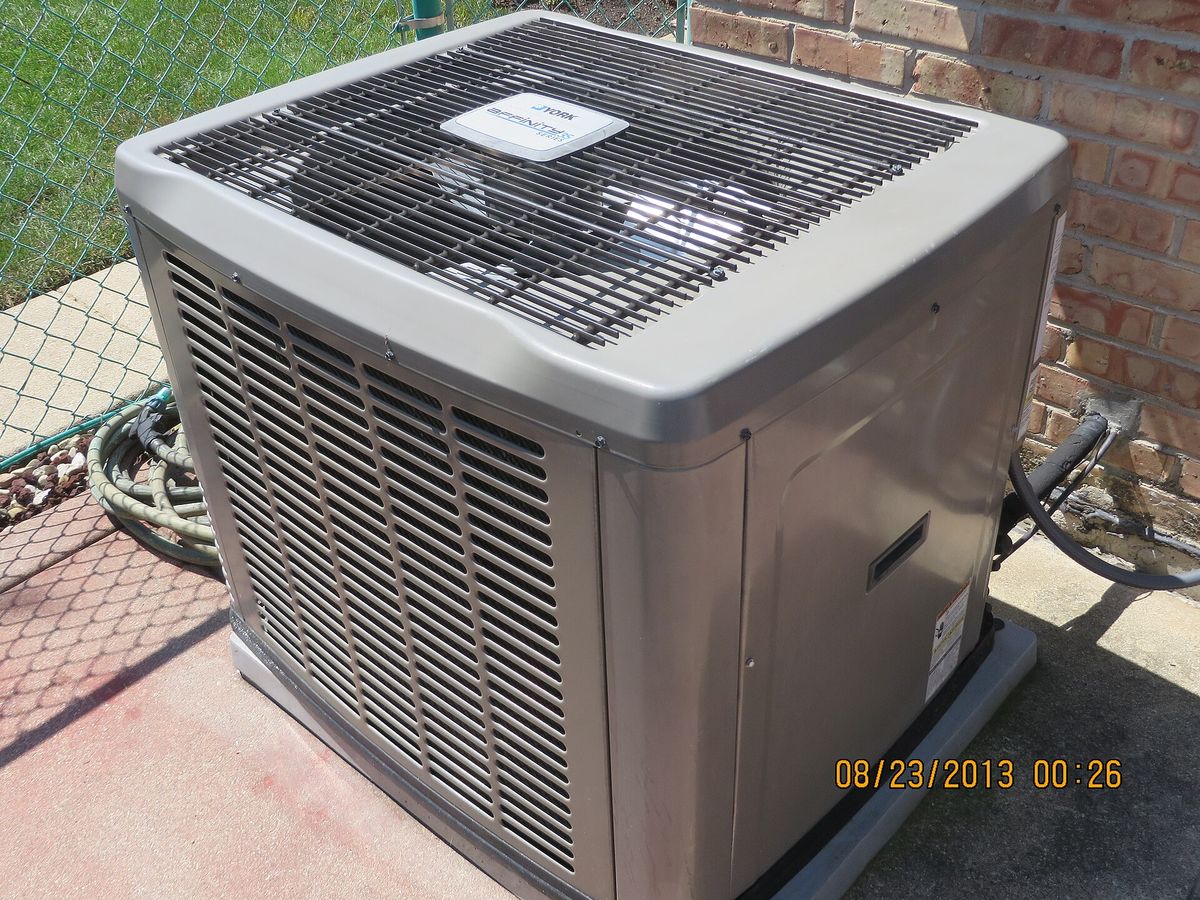 York Affinity central air conditioning condenser unit beside a house