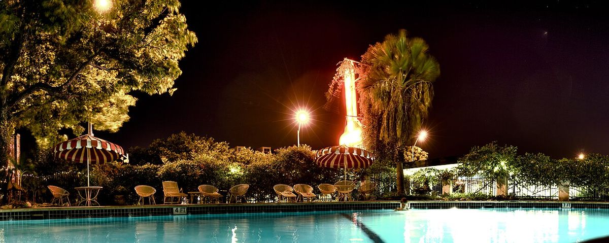 LED lights glowing in a pool at night