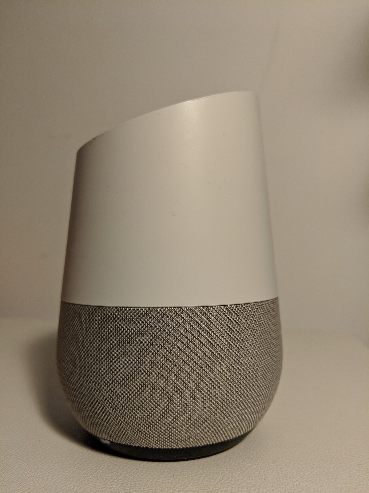 Smart speaker voice assistant in a living room